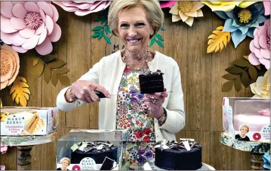  ?? ?? HELPING: Great British Bake Off star Mary Berry works with Finsbury Foods, which has successful­ly cut costs