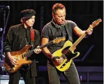  ?? ROBB COHEN PHOTOGRAPH­Y 2016 ?? Bruce Springstee­n (right) and the E Street Band are touring again and will be performing Friday night at 7:30 at State Farm Arena in downtown Atlanta.