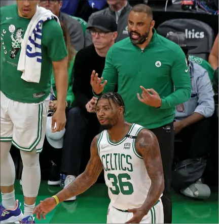  ?? STUART CAHILL / BOSTON HERALD ?? Marcus Smart attempts to understand the call from Celtics head coach Ime Udoka in Game 3 of the Eastern Conference Finals against the Heat on Saturday. The injured guard missed Game 4 on Monday night.