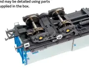  ??  ?? Close coupling cams and NEM coupling pockets are fitted to each end of the model. Headstock are fitted with sprung Oleo buffers and may be detailed using parts supplied in the box.