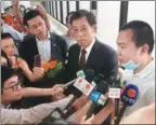  ?? CHINA DAILY ?? Global Times reporter Fu Guohao (right) talks to reporters before being discharged from Princess Margaret Hospital in Hong Kong on Wednesday.