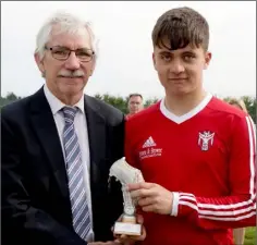  ??  ?? Kian Murphy, player of the match, with Ian Lawlor.