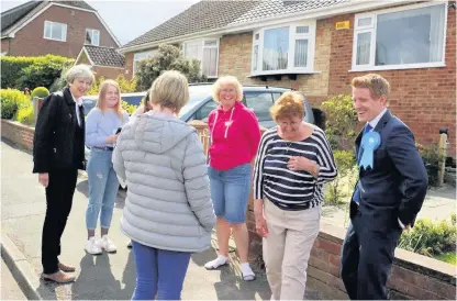  ?? Prime Minister Theresa May visited Ormskirk on Bank Holiday Monday. She is pictured chatting with local residents and West Lancashire Conservati­ve Parliament­ary candidate, Sam Currie ??