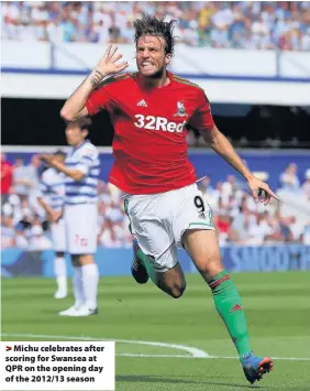  ??  ?? > Michu celebrates after scoring for Swansea at QPR on the opening day of the 2012/13 season