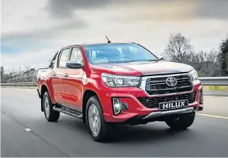  ??  ?? Toyota has given its Hilux more of a Ranger look.
