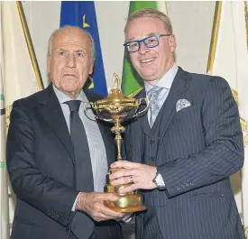  ??  ?? Franco Chimenti, left, president of the Italian Golf Federation, and Keith Pelley, CEO of the PGA European Tour, pose with the Ryder Cup.