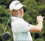  ?? Jared C. Tilton / Getty Images ?? Jordan Spieth was two shots out of the lead at the start of Saturday, but was trailing by six after his round of 72.