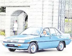  ??  ?? Sultan Ibrahim driving the Proton Saga car which was given as a gift in 1985 by Dr Mahathir to the Johor Sultan’s late father, Sultan Iskandar.