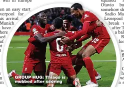  ?? ?? GROUP HUG: Thiago is mobbed after scoring