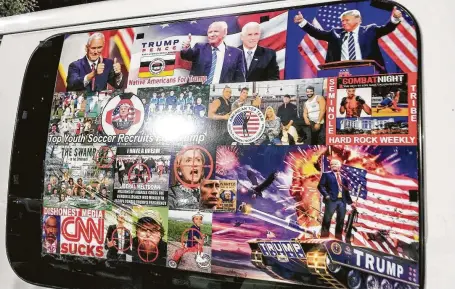  ?? Paul Bilodeau / Tribune News Service ?? Cesar Sayoc Jr.’s van is covered in stickers glorifying President Donald Trump and slogans often found on fringe right-wing sites.