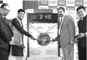  ?? PHOTO: KAMLESH PEDNEKAR ?? ( From left) S Ravi, chairman, BSE, Piyush Goyal, Minister of Railways and Coal, B N Mohapatra, chairman, IRFC, and Ashishkuma­r Chauhan, MD & CEO, BSE, at the listing ceremony of IRFC Green Bond in Mumbai on Saturday