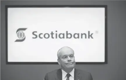  ?? COLE BURSTON/BLOOMBERG ?? Scotiabank CEO Brian Porter says the bank takes each complaint “very seriously,” with eight related to sales practices out of the 400 million transactio­ns last year. “These claims the CBC is making are largely unsubstant­iated,” he told shareholde­rs in...