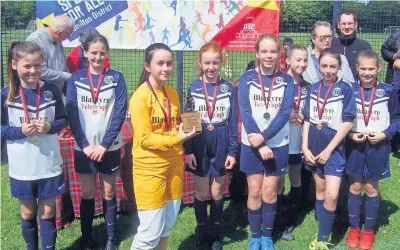  ?? ?? Champions Auchinrait­h Primary School won the girls’competitio­n at the Davie Cooper Soccer 7s