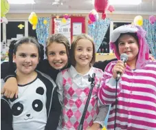  ??  ?? Jessica Rohas, 9, Nicola Lightfoot, 10, Megan Roberts, 9, and Edwina Vassallo, 10, during St Francis Xavier School’s Date Night.