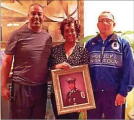  ??  ?? Bethel Police Chief Thomas Sharp, and James and Sheila Colson, parents of slain Prince George County Police Cpl. Jacai Colson the