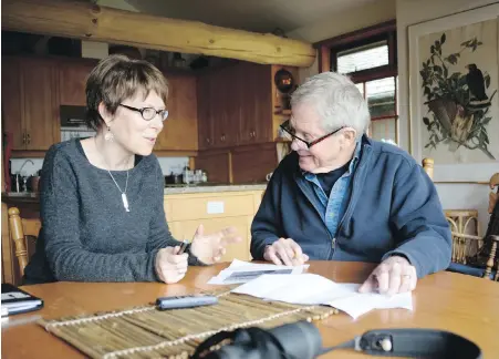  ??  ?? Author and counsellor Tessa Lloyd interviews Robert Bateman for her book Forty Fathers: Men Talk about Parenting. Bateman is among the well-known names who shared their hard-won advice on being a father.