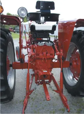  ??  ?? The business end of the Farmall 504 shows off the standard 3-point, which was much more universal than IH’S fast hitch system, swinging drawbar, optional dual remotes and the standard 540 rpm PTO. The upper link is not installed right now.