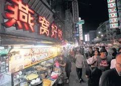  ??  ?? TOURIST ATTRACTION: Street food along Yaowarat Road in Chinatown.