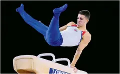  ??  ?? Horsing around: Max Whitlock shows his skills during the men’s pommel final in Montreal