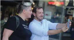  ?? (Marc Israel Sellem/The Jerusalem Post) ?? ASAF ZAMIR takes a selfie with Chen Arieli, an LGBT activist who is on his list for city council.