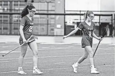  ?? ANNE-MARIE CARUSO/NORTHJERSE­Y.COM ?? Academy of the Holy Angels’ freshmen Rose Dooley, left, and Jane Tenaglia have led their team to a 6-0 start with their goal production and dominant midfield play.