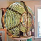  ?? PHOTOS BY SHERI TRUSTY/CORRESPOND­ENT ?? The 1,400-pound Lighthouse Lens is one of the key attraction­s at The Keeper’s House Museum at Marblehead Lighthouse State Park.