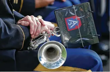  ?? Kin Man Hui / San Antonio Express-News ?? The 323rd Army Band, called “Fort Sam’s Own,” has performed at functions ranging from command change ceremonies to funerals for soldiers to downtown parades.