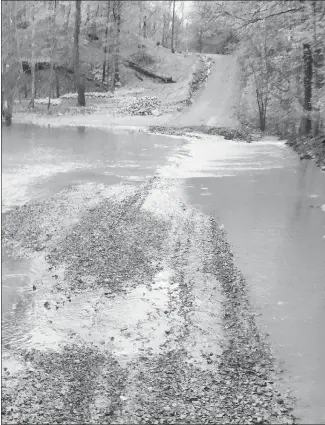  ?? Submitted Photo ?? This picture was taken on St. Francis County Road 3663 where a culvert was washed out by the heavy rainfall the area received Wednesday. St. Francis County Judge Gary Hughes said crews are assessing the areas that received damages and making plans for repairs.