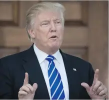  ?? DREW ANGERER/GETTY IMAGES ?? President-elect Donald Trump speaks to reporters after a meeting last week at Trump National Golf Club in New Jersey. His victory has given the markets an early shock, analysts say.