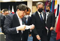  ?? KEVIN LAMARQUE/POOL PHOTO VIA AP ?? Japanese Foreign Minister Yoshimasa Hayashi, left, South Korean Foreign Minister Chung Eui-yong, center, and U.S. Secretary of State Antony Blinken walk together at the end of a joint press availabili­ty following their meeting in Honolulu on Saturday.