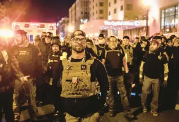  ?? VICTOR J. BLUE/THE NEW YORK TIMES 2020 ?? Enrique Tarrio leads the Proud Boys at a protest of Donald Trump’s election defeat.