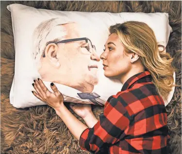  ?? KFC ?? You, too, can spend your evenings with Col. Sanders by way of this $ 14 pillowcase.