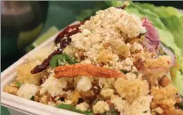  ??  ?? Melissa “Mem” Frabotta’s nam khao lettuce wraps are stuffed with crispy rice and rolled in lettuce leaves.