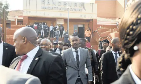  ?? Picture: Itumeleng English/African News Agency (ANA) ?? MORAL SUPPORT: Former president Jacob Zuma and Duduzane leave the Randburg Magistrate’s Court yesterday. Duduzane appeared in court on a culpable homicide charge.