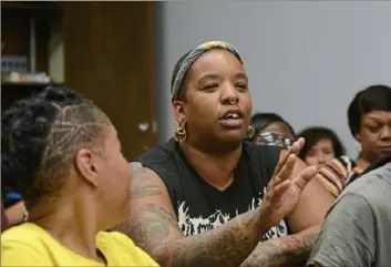  ?? Christian Snyder/ Post- Gazette ?? Nique C, a non- binary individual and transgende­r rights advocate, speaks at a hearing Monday to discuss treatment of transgende­r inmates at the Allegheny County Jail.