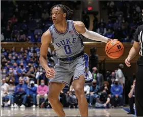  ?? (AP/Ben McKeown) ?? Duke’s Wendell Moore Jr. finished with 19 points, 10 rebounds and 10 assists during the Blue Devils’ victory over Army on Friday night, becoming the third Duke player to post a triple-double under Coach Mike Krzyzewski.