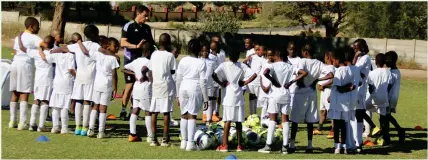 ?? Photo: Maqonda Ndlovu ?? Eager to learn… Real Madrid Foundation coaches giving instructio­ns to children during the football clinics programme at Moses van der Byl sports field.