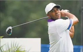  ?? Chris Carlson / Associated Press ?? Harold Varner III drives on the 18th hole during Thursday’s first round of the Wyndham Championsh­ip at Sedgefield Country Club in Greensboro, N.C.