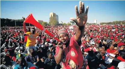  ?? /Reuters ?? Sea of red: Supporters of Nelson Chamisa’s opposition Movement for Democratic Change attend the final election rally in Harare on Saturday before the presidenti­al poll on Monday.
