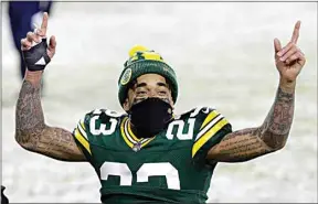  ?? MIKE ROEMER / AP ?? Green Bay Packers’ Jaire Alexander celebrates after a game against the Tennessee Titans Dec. 27 in Green Bay, Wis.