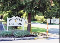  ?? Hearst Connecticu­t Media file photo ?? A swastika and some profanity was found etched in paint of the boys bathroom at Holmes Elementary School in Darien on Monday.