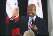  ?? AP PHOTO/CHARLIE NEIBERGALL ?? Sen. Tim Scott, R-S.C., speaks Feb. 22 during the Republican Party of Polk County Lincoln Dinner in West Des Moines, Iowa.