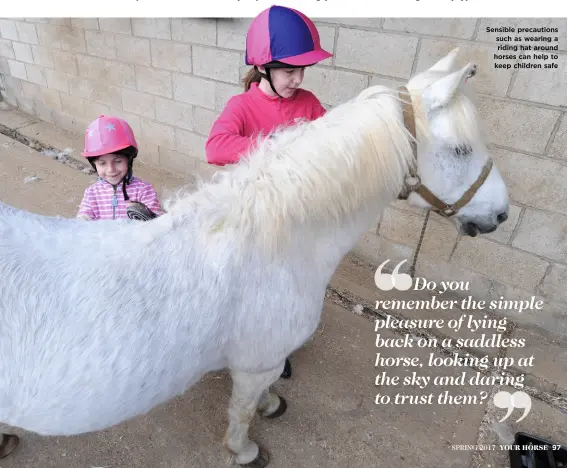  ??  ?? Sensible precaution­s such as wearing a riding hat around horses can help to keep children safe