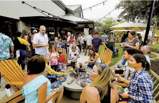  ?? FOR THE U-T ?? CHARLIE NEUMAN
My Yard Live has a 7,500-square-foot outdoor area with picnic grounds, a concert stage, a cornhole field and a playground.
