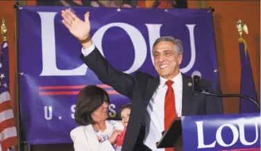  ?? Mark Makela / Getty Images ?? Rep. Lou Barletta, R-Pa., backed by President Trump, celebrates after his victory in the Senate primary.