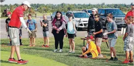  ?? [PHOTOS BY EL RENO TRIBUNE] ?? Jay Mauldin, volunteer site coordinato­r and coach at Crimson Creek Golf Course in El Reno, talks about respect to First Tee participan­ts.