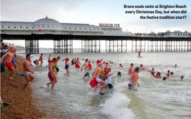  ?? ?? Brave souls swim at Brighton Beach every Christmas Day, but when did the festive tradition start?