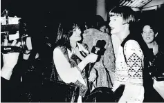  ??  ?? Jeanne Beker interviews Canadian supermodel Linda Evangelist­a in 1997. The ’90s, says Beker, ‘were about minimalism. It was a bit of a reality check. ”