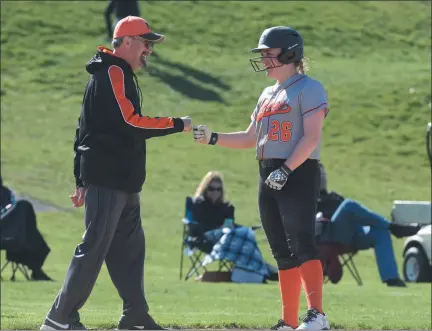  ?? AUSTIN HERTZOG - MEDIANEWS GROUP FILE ?? Perkiomen Valley’s Kara Fusco, right, is congratula­ted by head coach Joe Bogus after hitting a triple against Boyertown last season. Bogus, who coached softball at Phoenixvil­le and Perkiomen Valley among other stops and sports, died at 69on Tuesday.