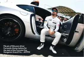  ??  ?? File pix of McLaren driver Fernando Alonso before for the start of the Formula One Hungarian Grand Prix. – AFPPIX